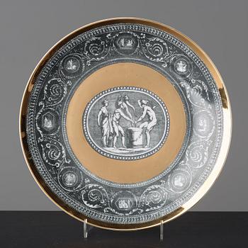 Piero Fornasetti, a set of six "Cammei" porcelain plates, Milano, Italy.