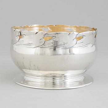 A Swedish Art Nouveau parcel-gilt caviar bowl with later glass liner, mark of GAB, Stockholm, 1911.