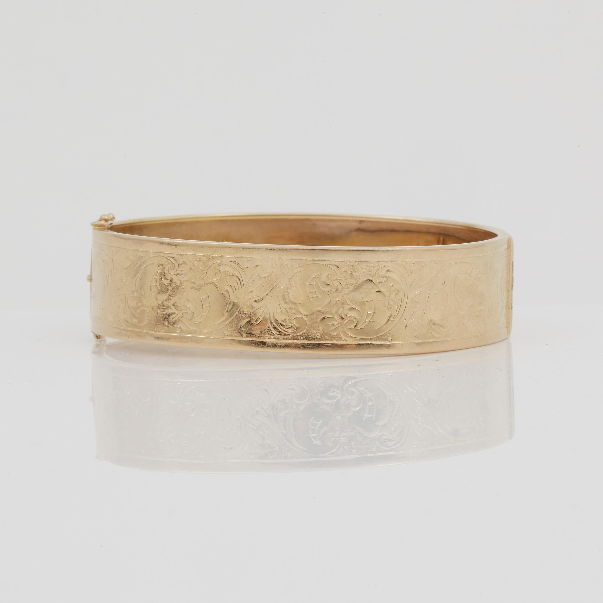 ARMRING, guld 18k, otydliga stämplar, otydliga svenska stämplar, 1900-tal. Vikt ca 23 gram.