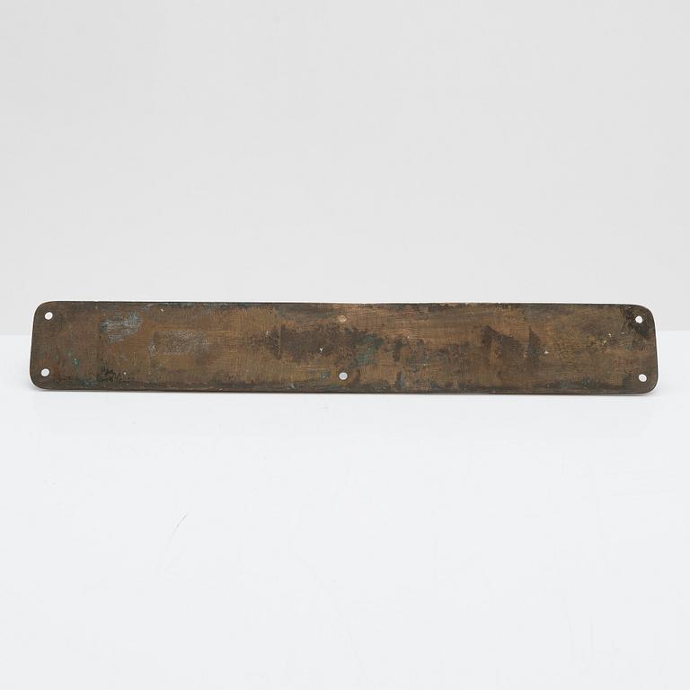 An Art Nouveau door handle from early 20th century.