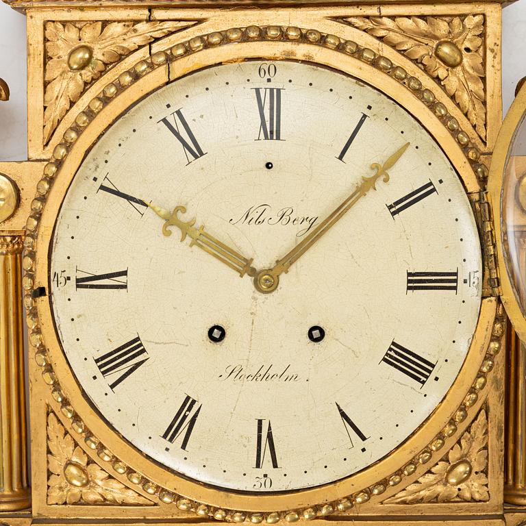 A Gustavian giltwood cartel clock by N. Berg (watchmaker in Stockholm 1751-94).
