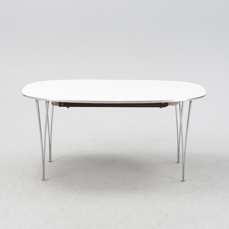 A 'Super elliptical' dining table by Bruno Mathsson & Piet Hein, from around the year 2000.