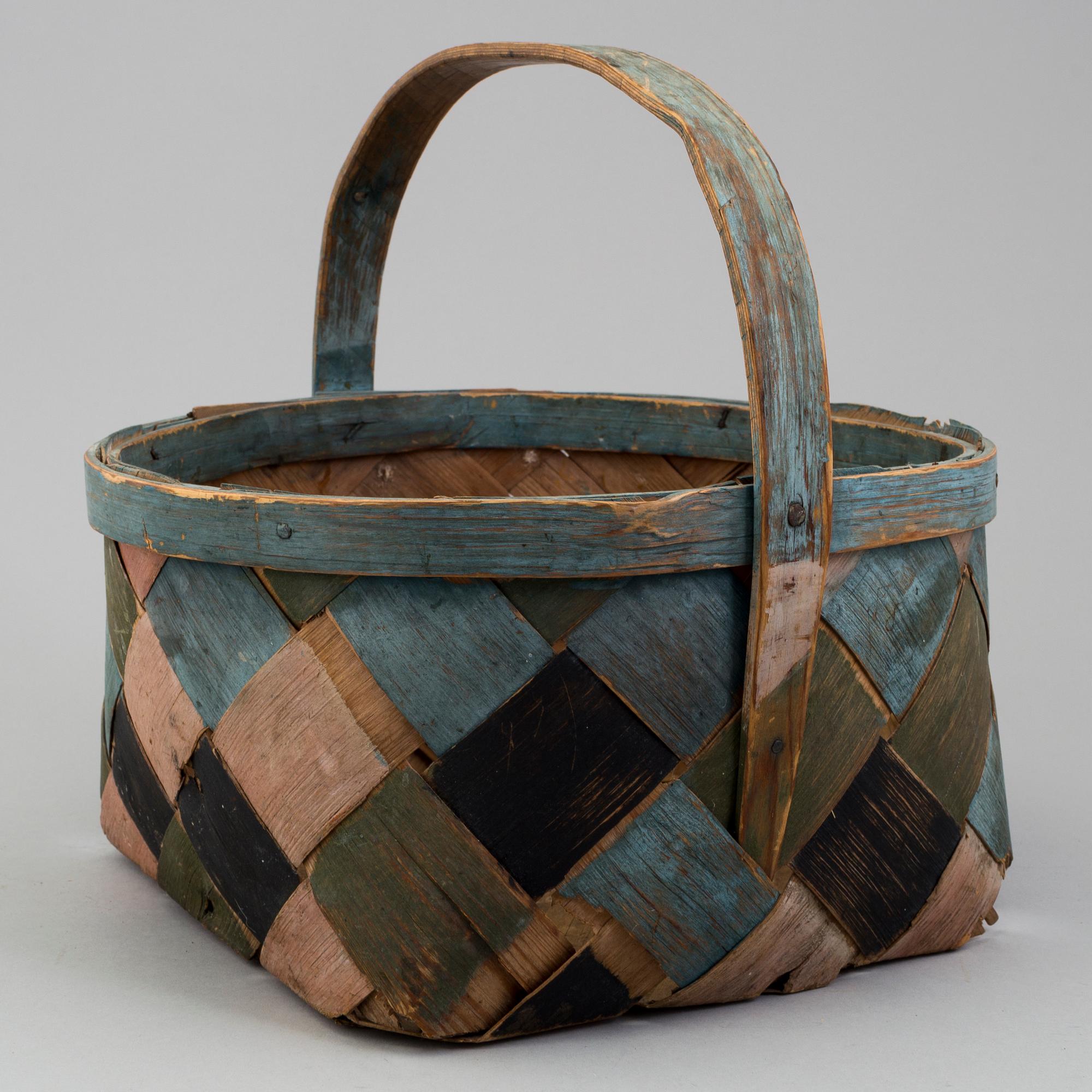 a painted basket from the 19th century.