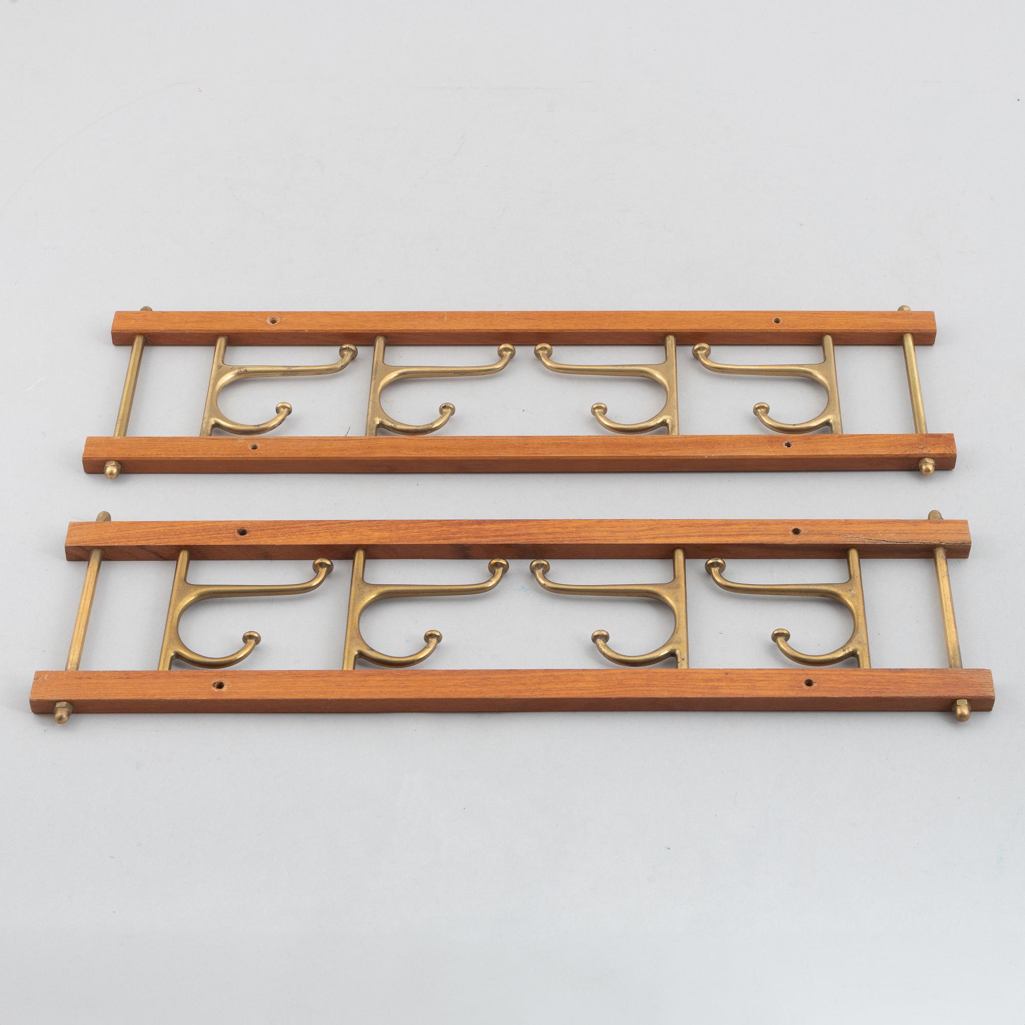 Klädhängare, ett par, "Dekorativ", Skoglunds metallgjuteri, Anderstorp, 1950-/60-tal.