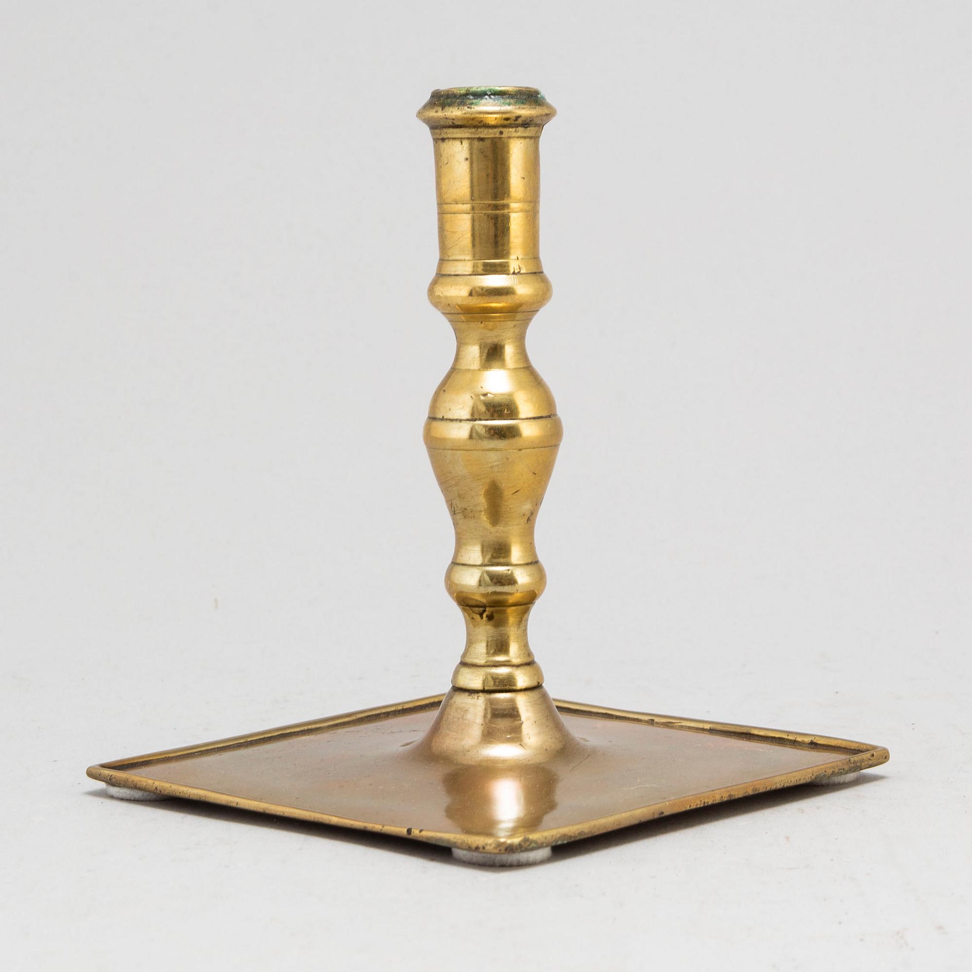A late 17th century Baroque bronze candlestick.