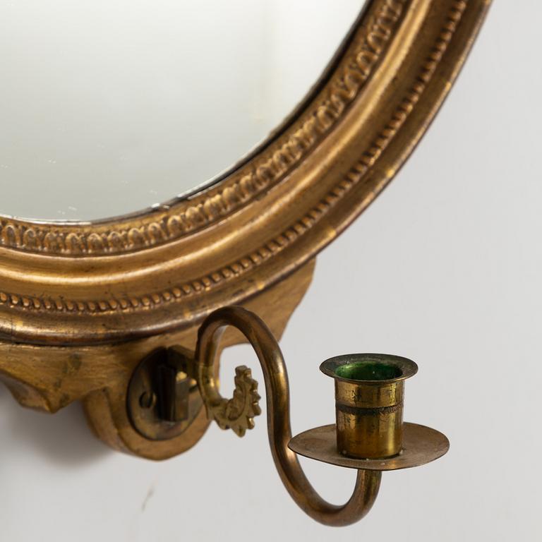 A pair of Gustavian style mirror sconces, early 20th centruy.