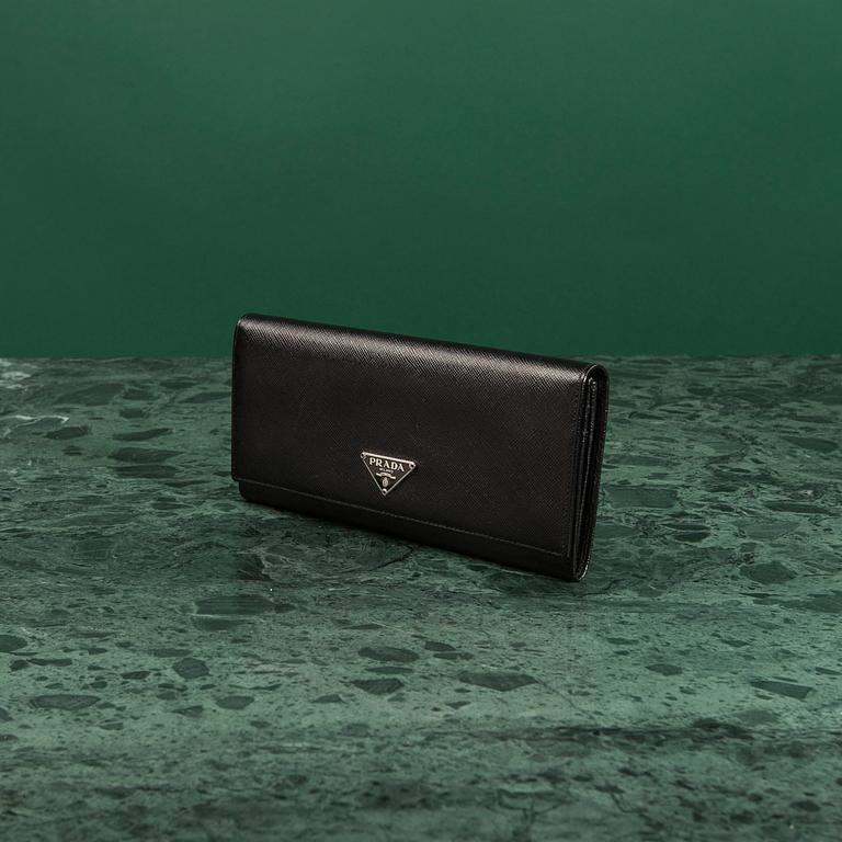 PLÅNBOK, Prada.