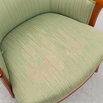A "Vår Fru" lounge chair by Cral Malmsten.