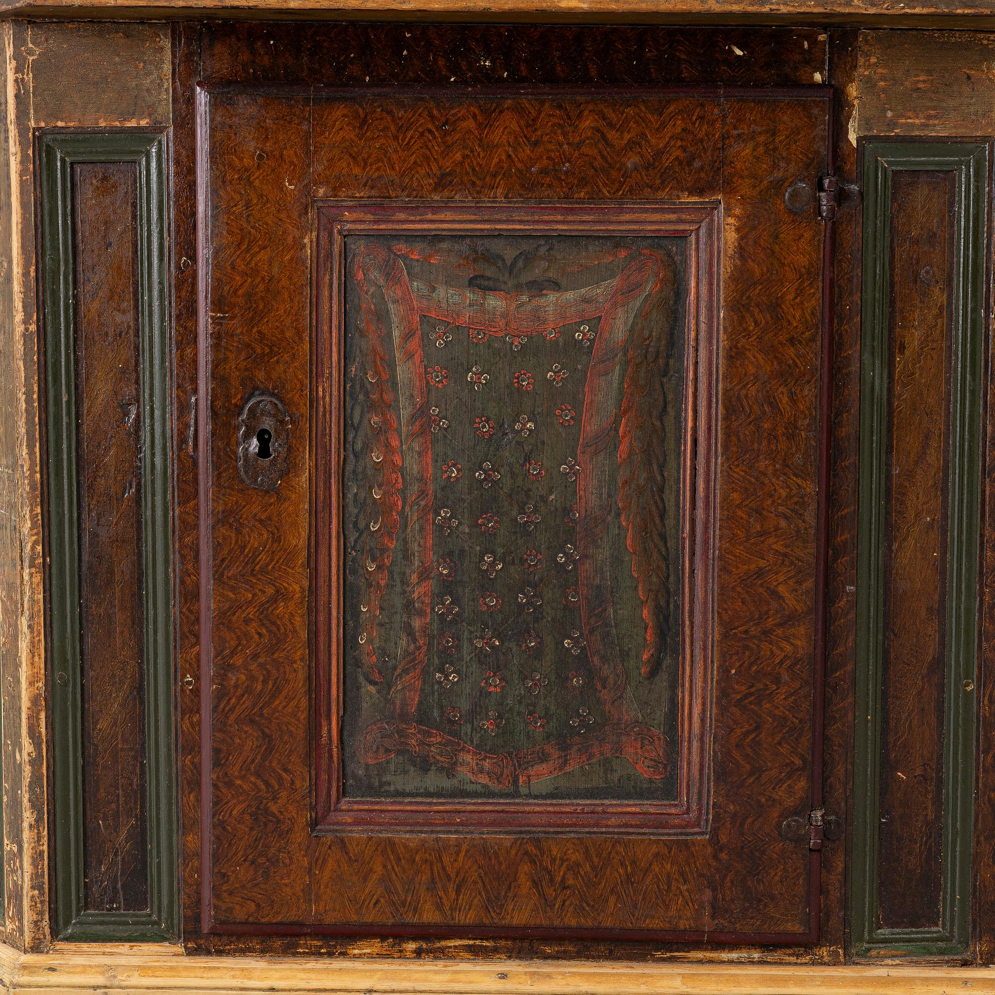 A corner cupboard, dated 1779.