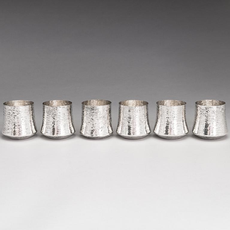 TAPIO WIRKKALA, A silver punch ladle and six silver beakers, marked TW,  Kultakeskus, Hämeenlinna, Finland 1976 an 1974.