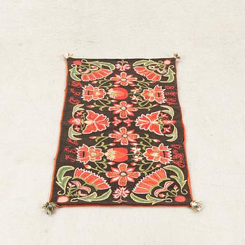 Carriage cushion (agedyna) from Skåne, dated 1828, embroidered, approximately 103x49 cm.
