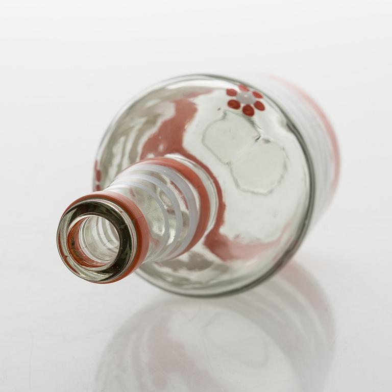 A set of 6 snapsglasses and a bottle designed by Aino Aalto for Karhula in the 1930-1940's.