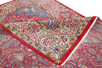 A Kashmar carpet, c. 390 x 298 cm.