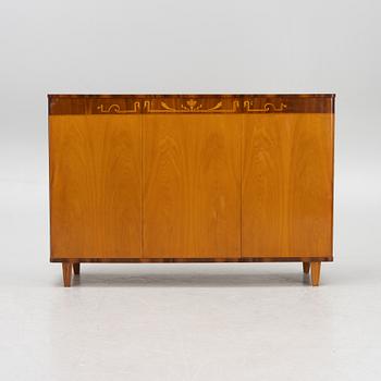 A Swedish Modern cabinet, 1940's.