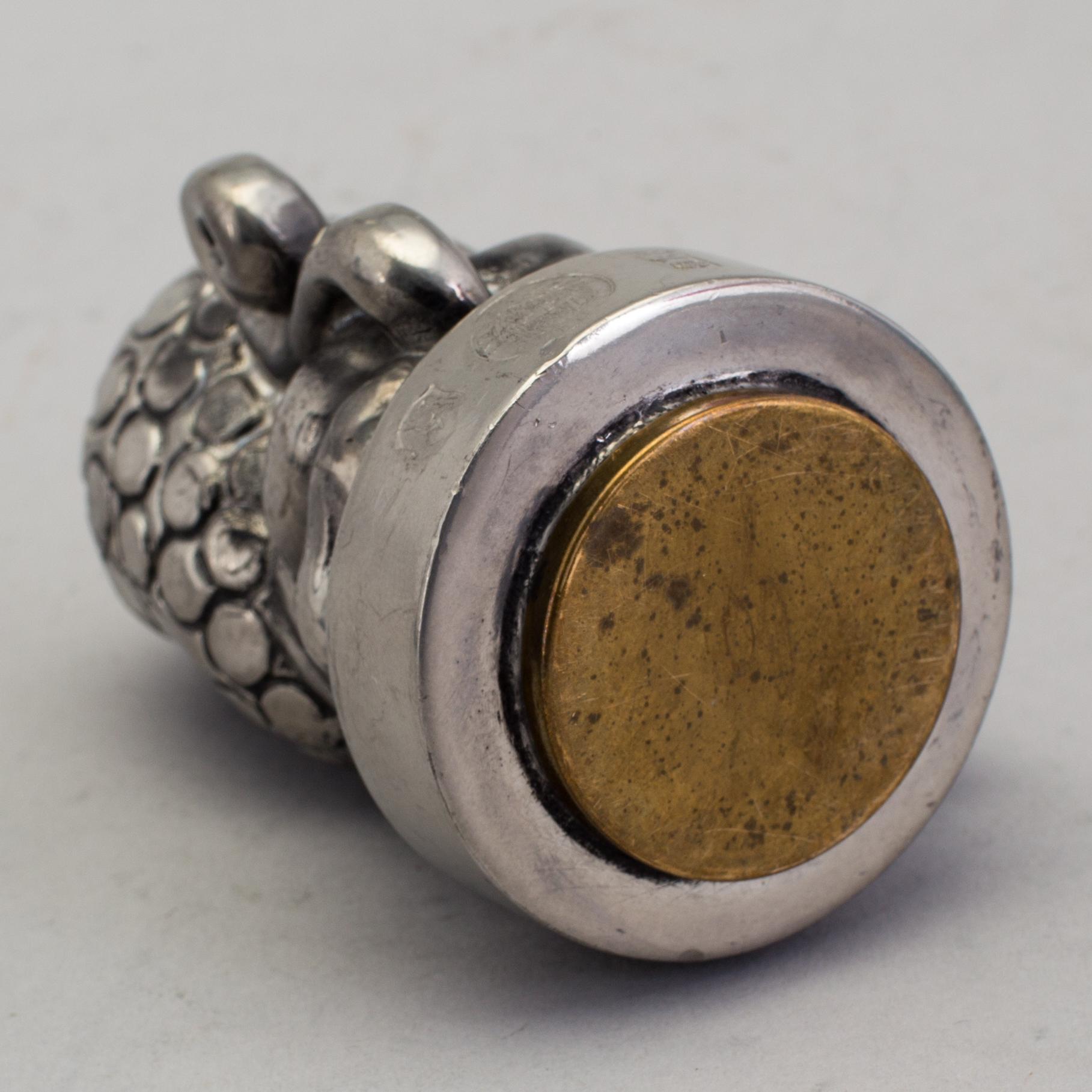 ANNA PETRUS, seal stamp with a brass stamp, pewter and brass, Svenskt Tenn, 1981 (year mark blurred).