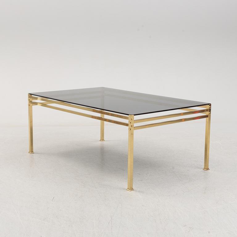 A second half of the 20th century glass and metal coffee table.