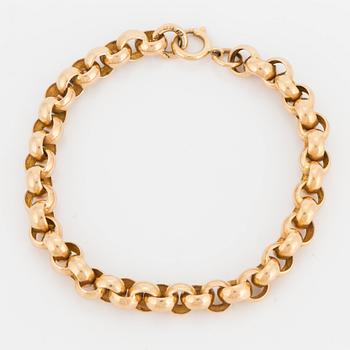 An 18K gold watch chain.