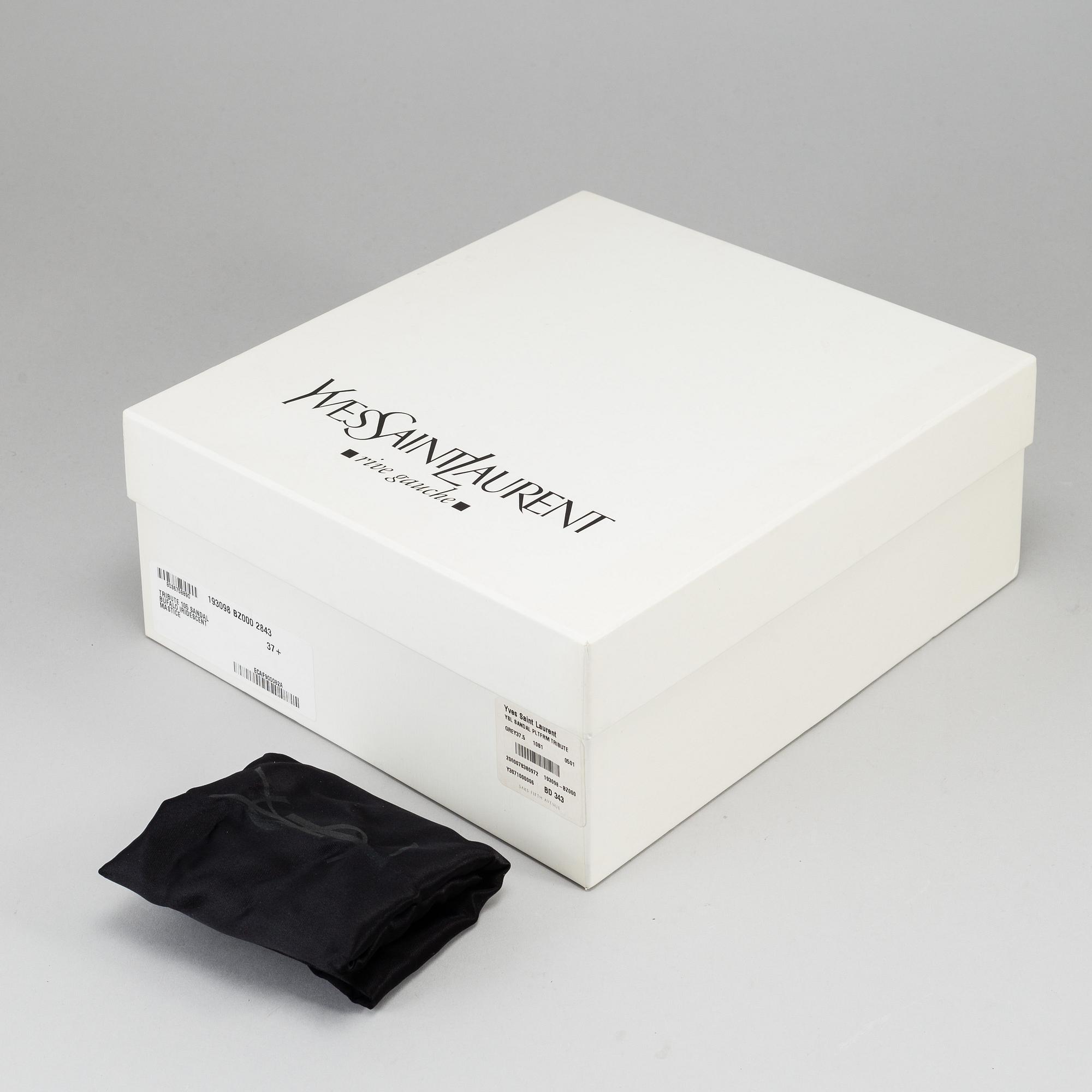 YVES SAINT LAURENT, a pair of open toe patent leather shoes, size 37½.