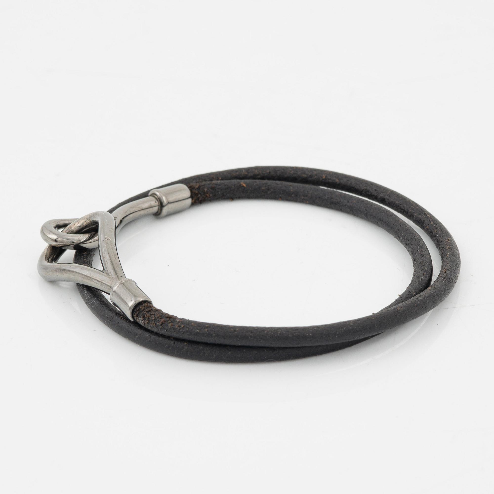 Hermès, a 'Jumbo' leather bracelet and a silk scarf.