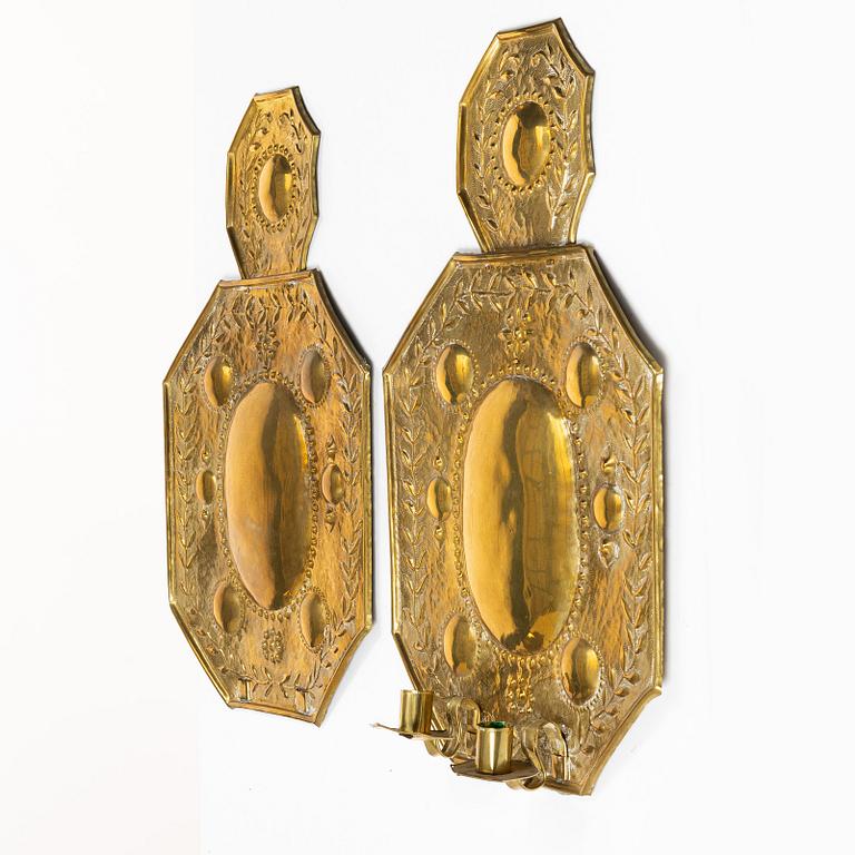 A pair of Barique-style brass wall sconces, early 20th century.
