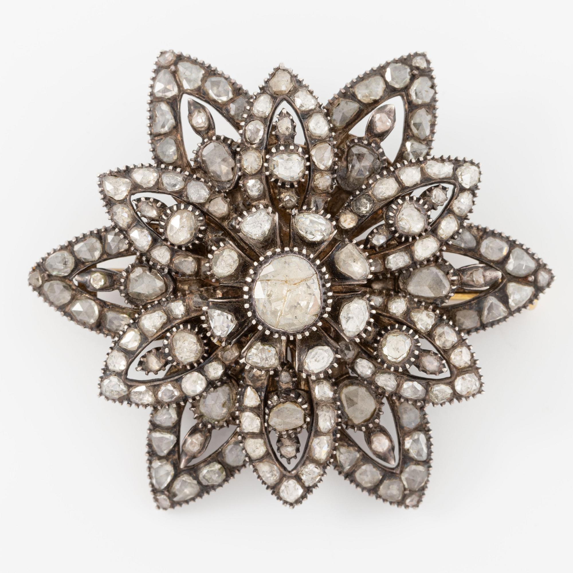 Brosch, silver med rosenslipade diamanter.