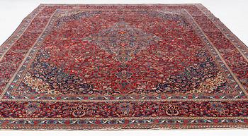 A semi-antique Kashan carpet, ca 437 x 304-310 cm.