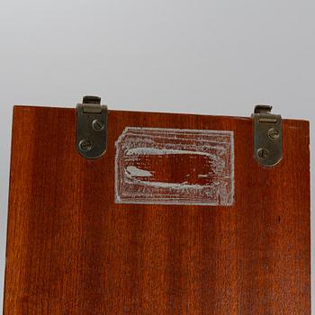 A 'String" bookcase, designed by  Nils Strinning,