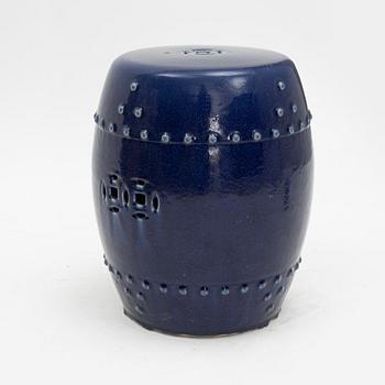 A barrel shaped Chinese blue glazed garden seat, 20th century.