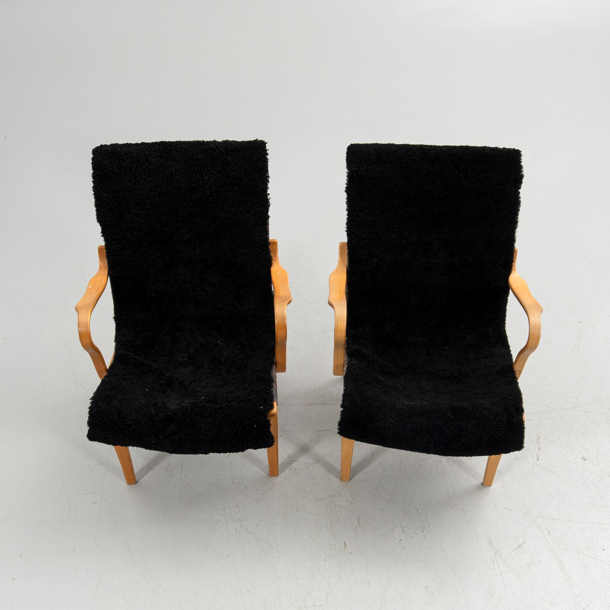 Bruno Mathsson, armchairs, a pair, "Eva", Bruno Mathsson International, Värnamo, second half of the 20th century.