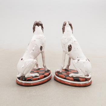 Decorative sculptures a pair England 20th century glazed ceramics.