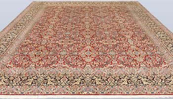 A Kirman Laver carpet, 'Millefleur', approx. 403 x 304 cm.