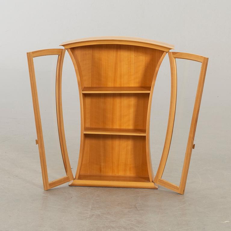 A WALL CUPBOARD DESIGN BY STAFFAN LAUTERS, CARL MALMSTENS VERKSTADSSKOLA 1980.