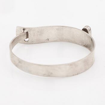 Elis Kauppi, A silver bracelet with a goldstone. Kupittaan kulta, Turku 1958.