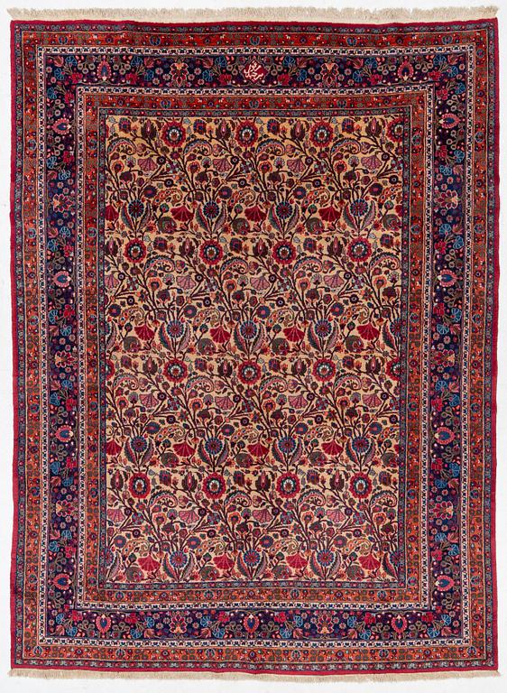 A semi-antique Birjand carpet, Eastern Iran, signed, c 390 x 296 cm.