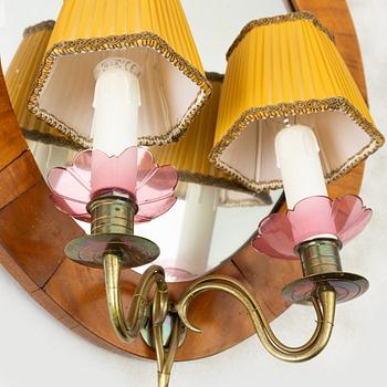 A pair of Swedish Empire mirror sconces, first half of the 19th century.