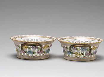 A pair of Royal Copenhagen "Flora Danica" chesnut baskets with stands, Denmark, mid 20th Century.