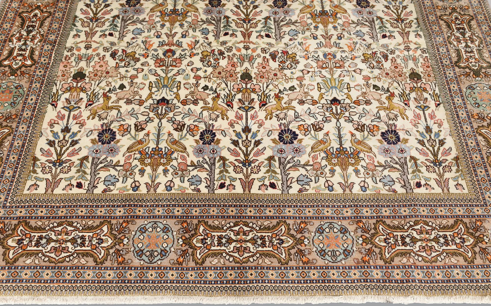 A Täbriz Tabatabai carpet, c.  352 x 240 cm.