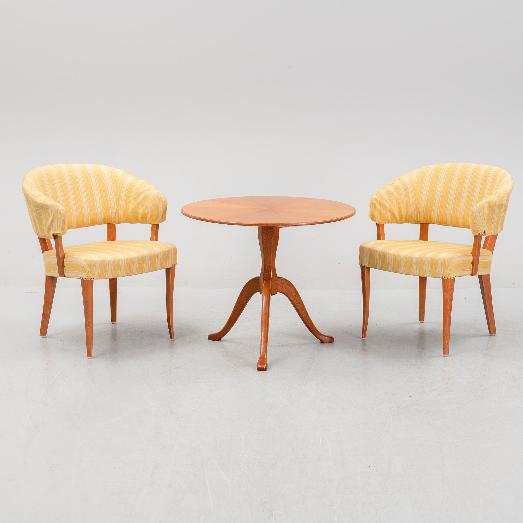 Carl Malmsten, a pair of 'Lata Greven' easy chairs, OH Sjögren, and a 'Berg' table, second half of the 20th Century.