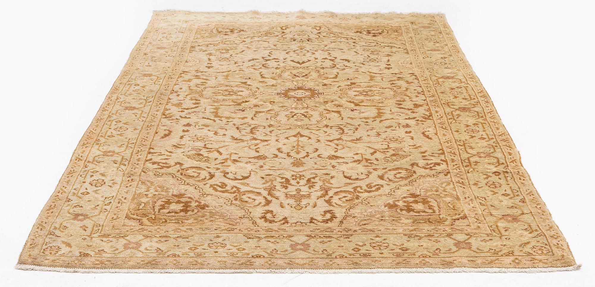 An Antique Amritsar rug, northern India, c. 212 x 122 cm.