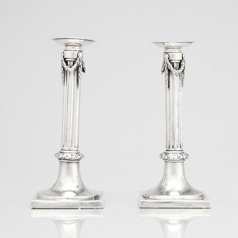 A pair of German 18th century silver candlesticks, marks of Johann Philipp Heckenauer, Augsburg 1787-1789.