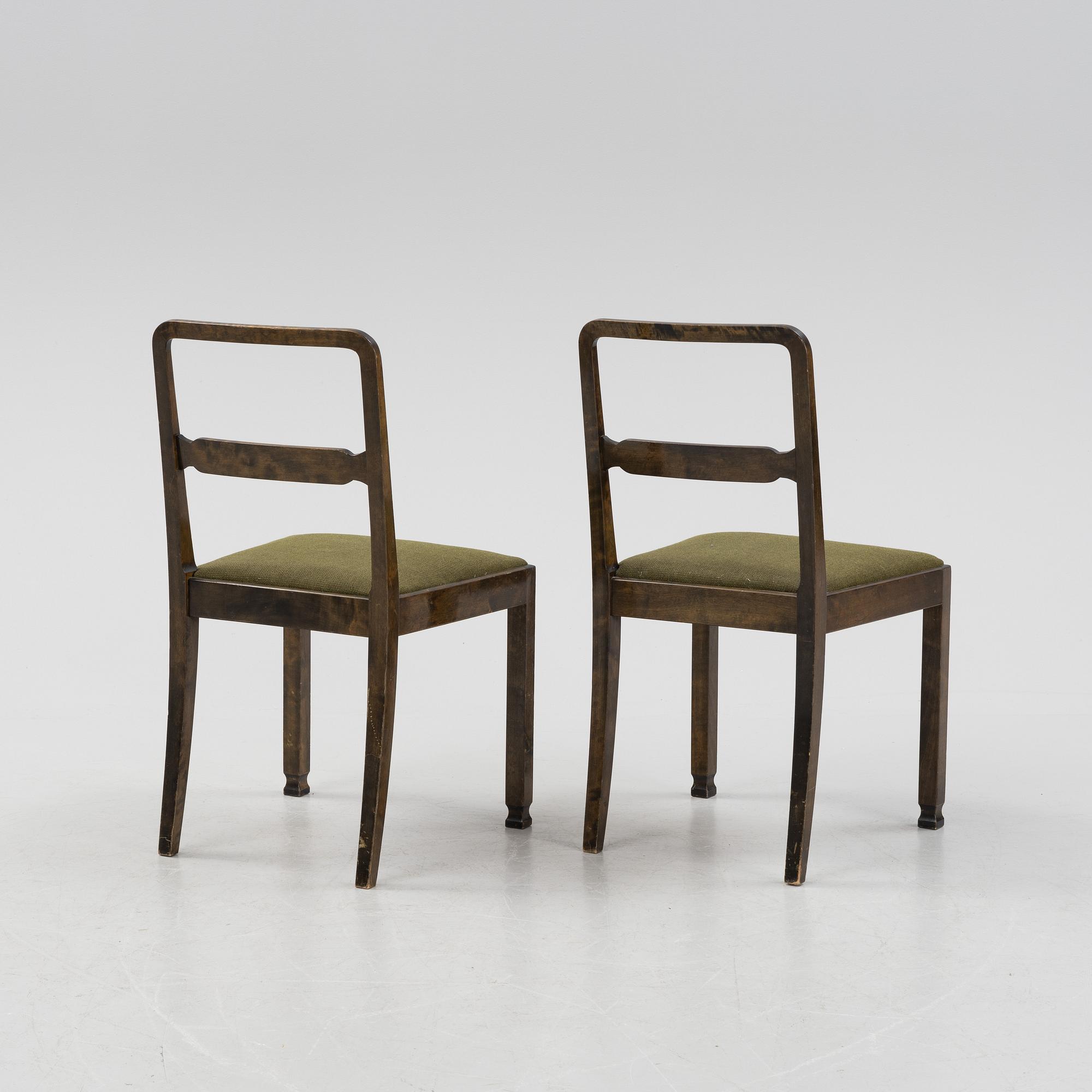 A Swedish Grace birch dining table and four chairs, 1920's/1930's.
