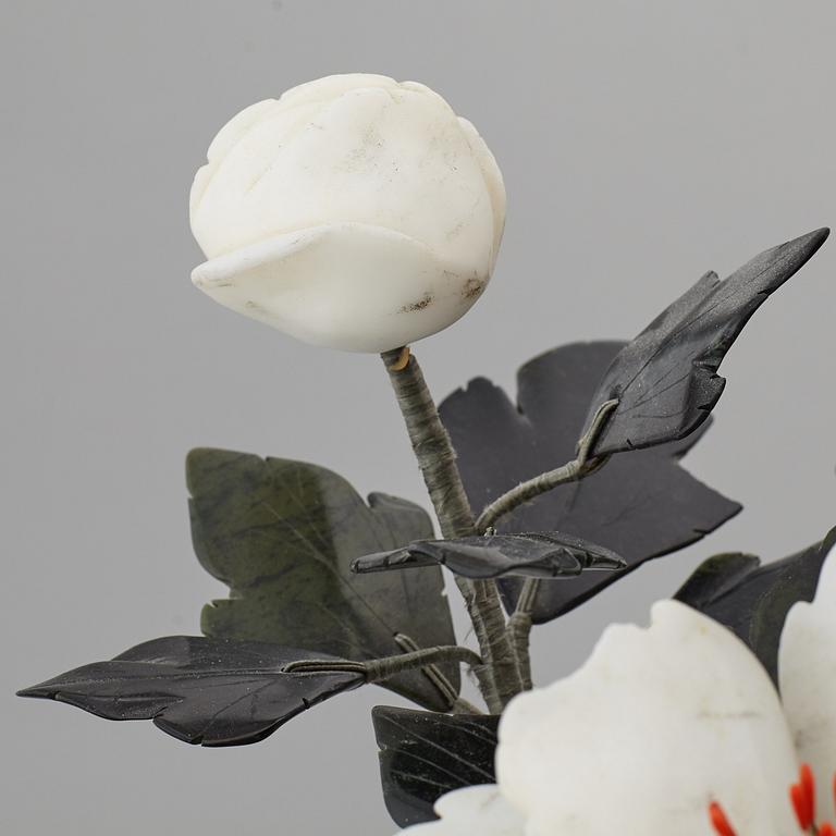 Two table decorations of different materials including agathe, nephrite quartz, stone, 20th century.