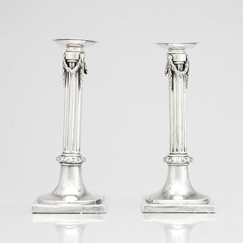 A pair of German 18th century silver candlesticks, marks of Johann Philipp Heckenauer, Augsburg 1787-1789.