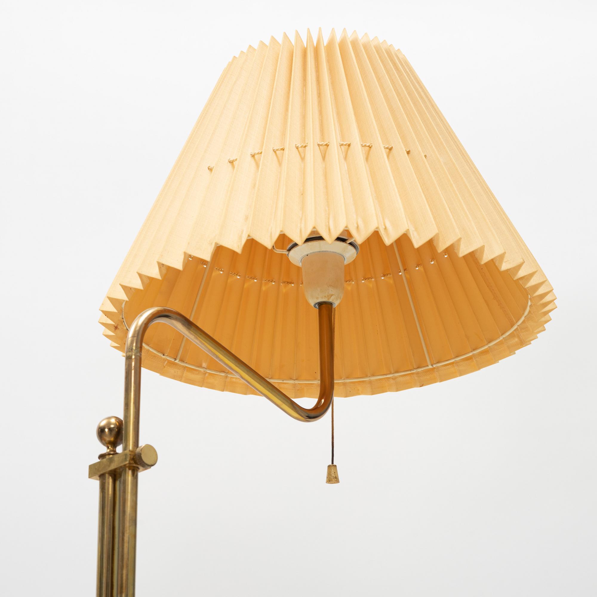 A brass floorlamp and table light 'B-132' from Bergboms, Sweden, second half of the 20th century.