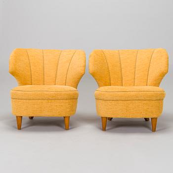 A pair of armchairs, mid-20th century.