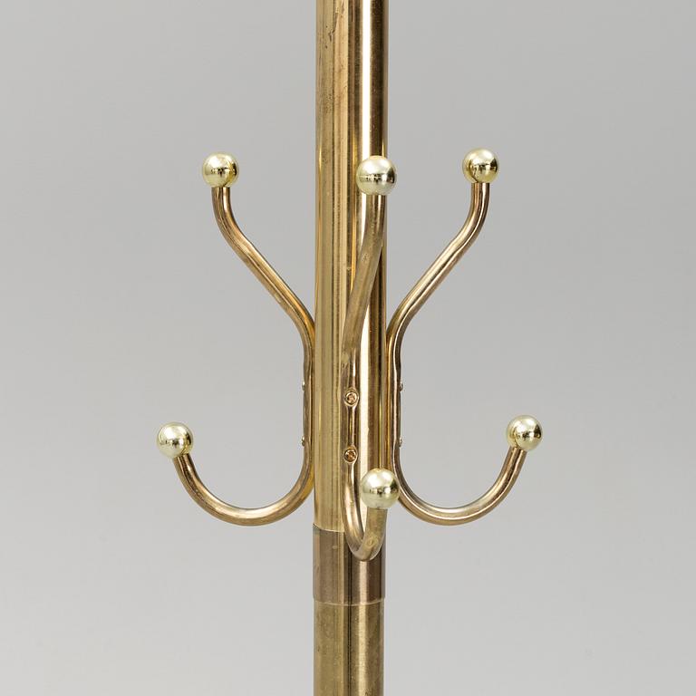 A late 20th century brass coat hanger.