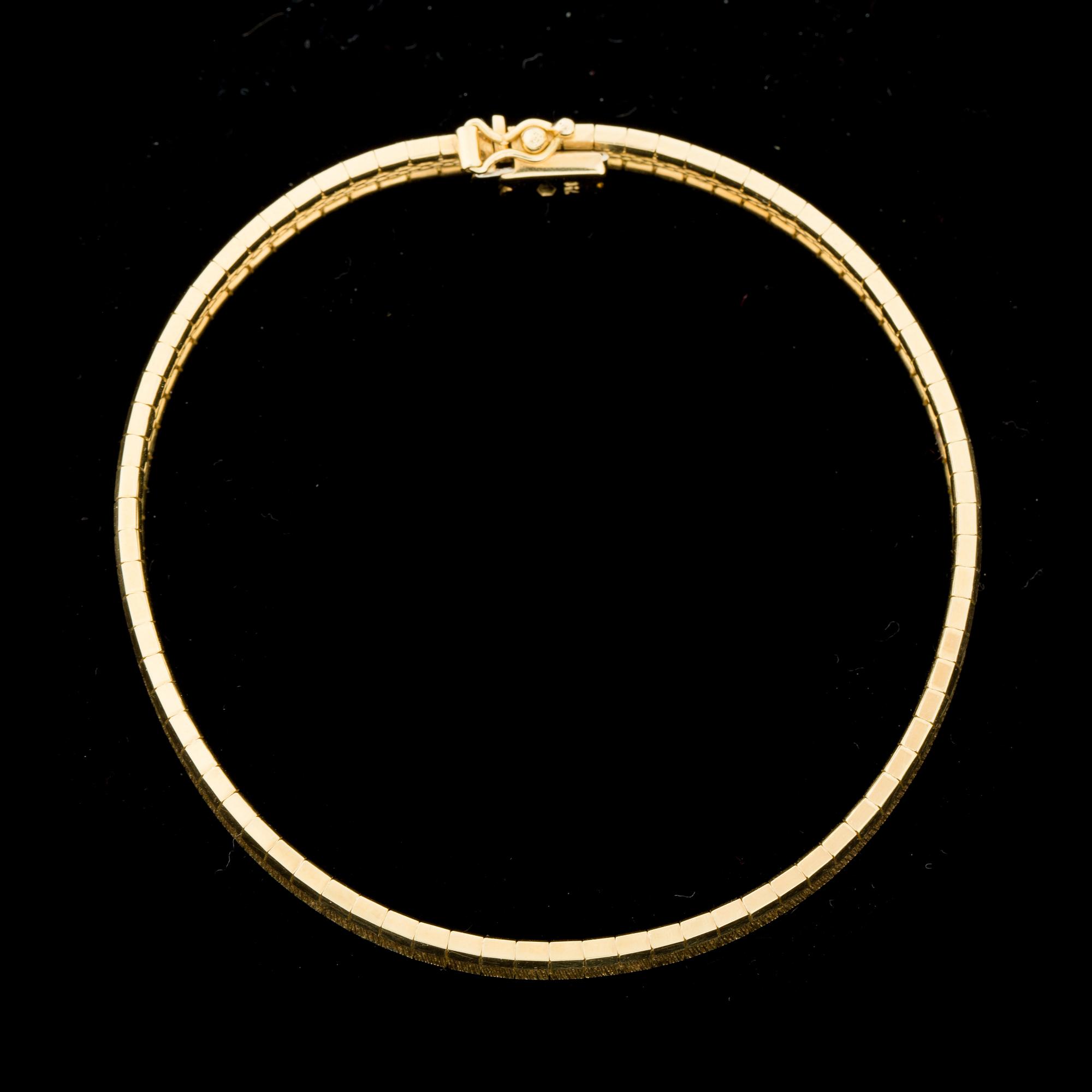 ARMBAND, 18 k guld. Vikt ca 25 g.