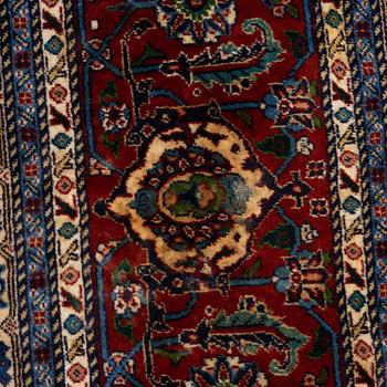 An oriental carpet, c. 371 x 264 cm.