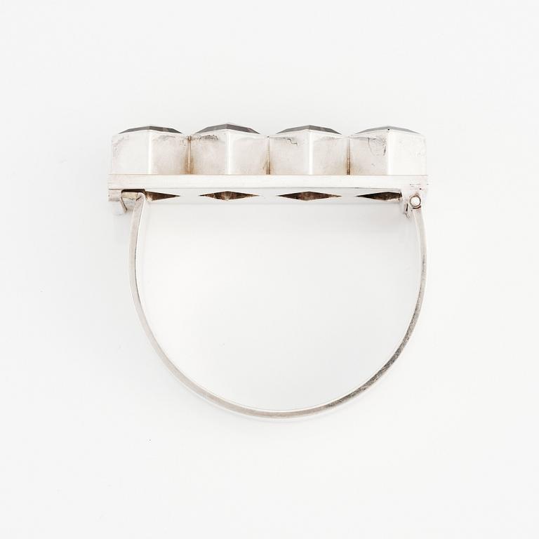 Sigurd Persson, a sterling silver, part gilt bangle with smoky qvartz (citrine), Stockholm 1963, executed by silversmith Peter Schmitt.