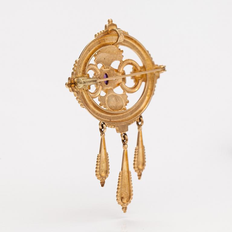 Otto Roland Mellin, A 14K gold brooch/pendant "Memory" with cultured pearls and an amethyst. Kalevala Koru, Helsinki 199.